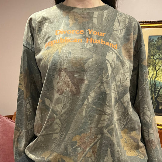 DIVORCE YOUR REPUBLICAN HUSBAND camo crewneck with orange text (2XL)