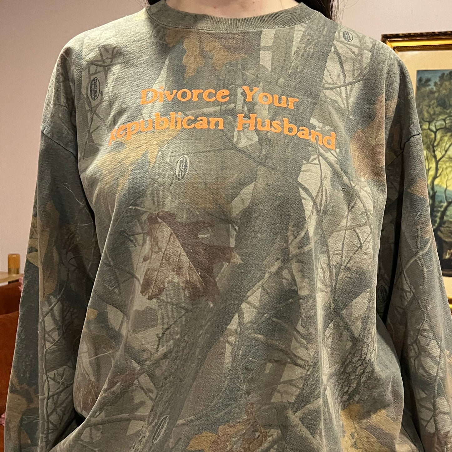 DIVORCE YOUR REPUBLICAN HUSBAND camo crewneck with orange text (2XL)