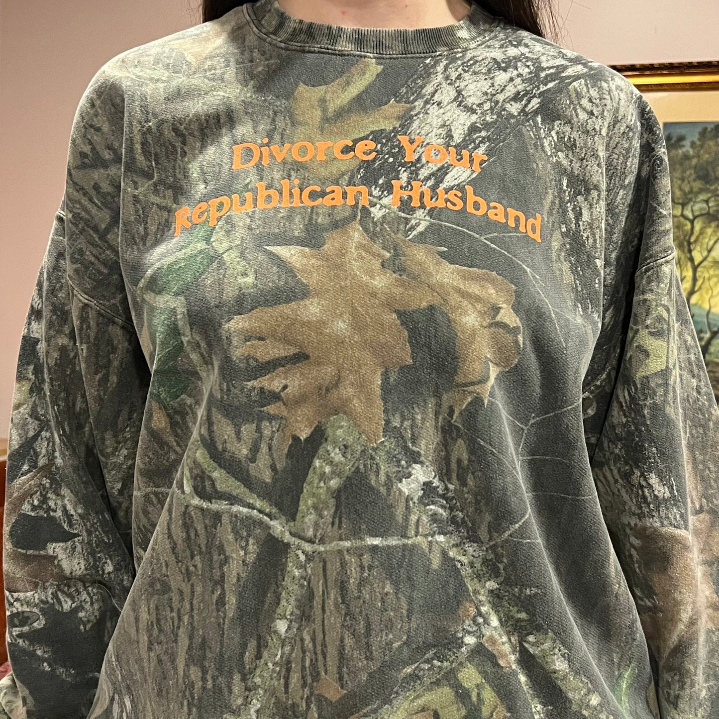 DIVORCE YOUR REPUBLICAN HUSBAND camo crewneck with orange text (XL)