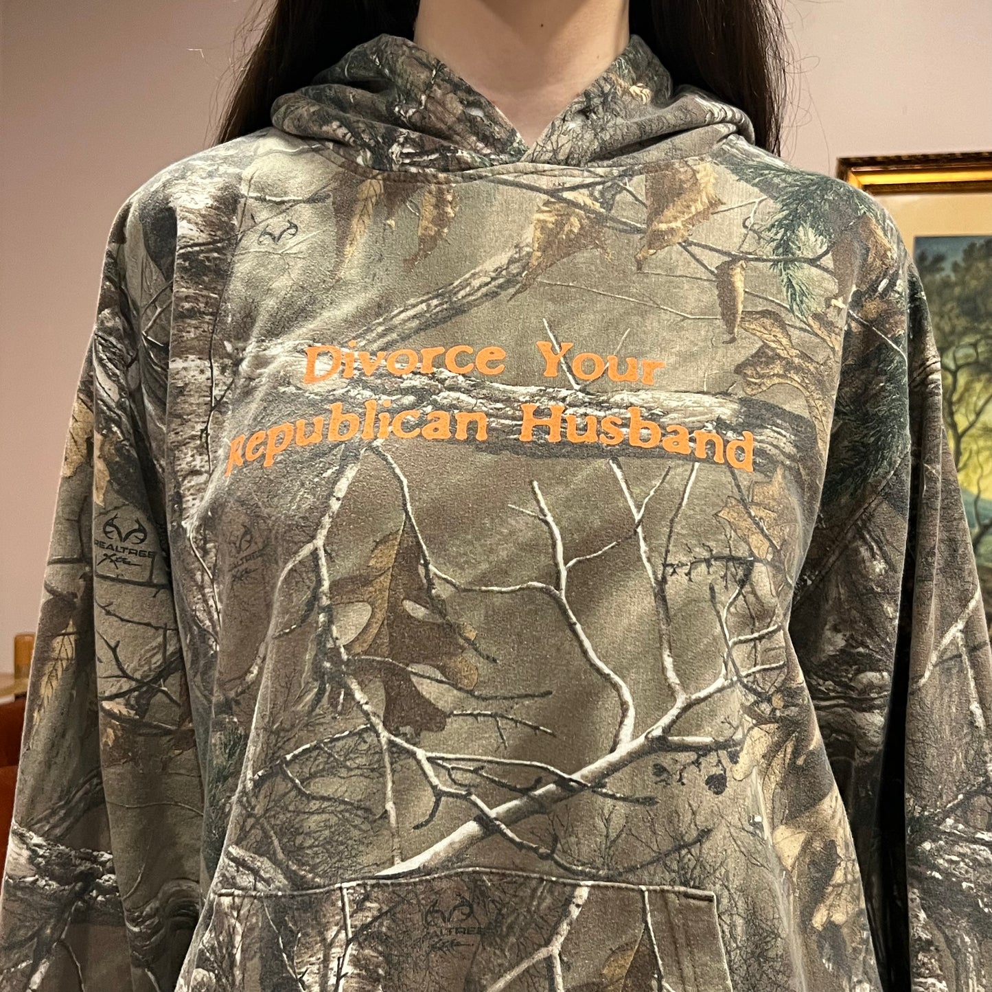 DIVORCE YOUR REPUBLICAN HUSBAND camo hoodie with orange text (XL)