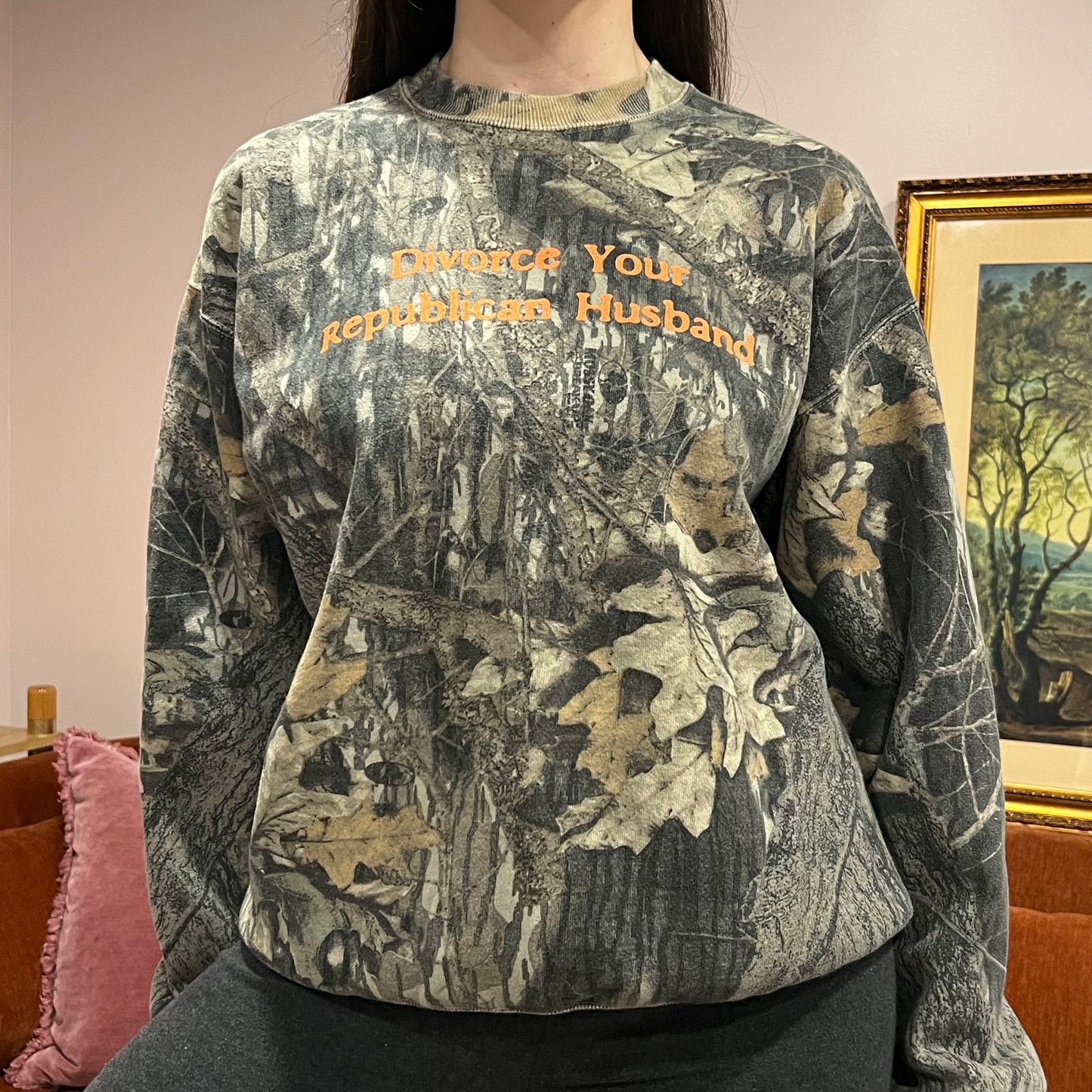 DIVORCE YOUR REPUBLICAN HUSBAND camo crewneck with orange text (L)