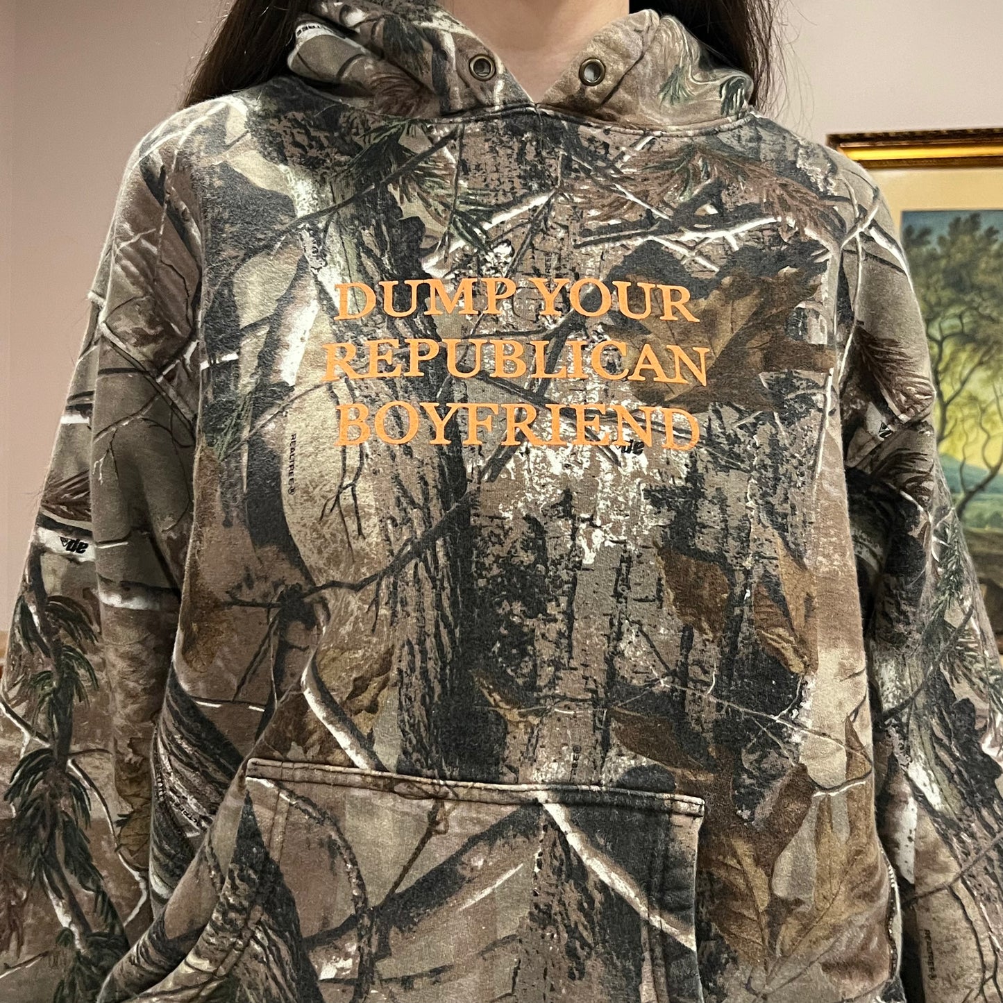 DUMP YOUR REPUBLICAN BOYFRIEND camo hoodie with orange text (XL)
