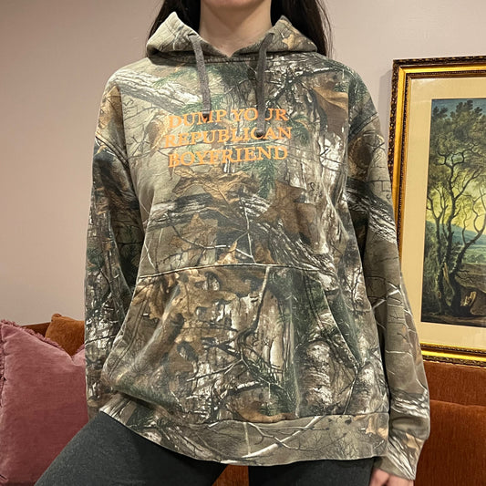 DUMP YOUR REPUBLICAN BOYFRIEND camo hoodie with orange text (XL)