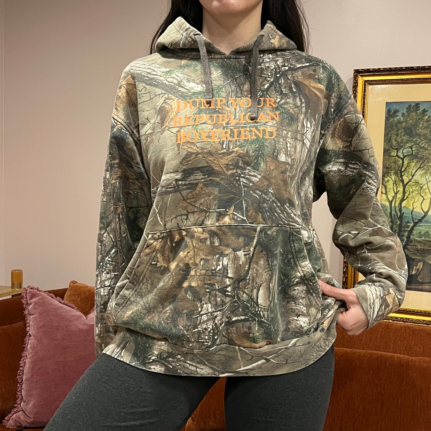 DUMP YOUR REPUBLICAN BOYFRIEND camo hoodie with orange text (XL)