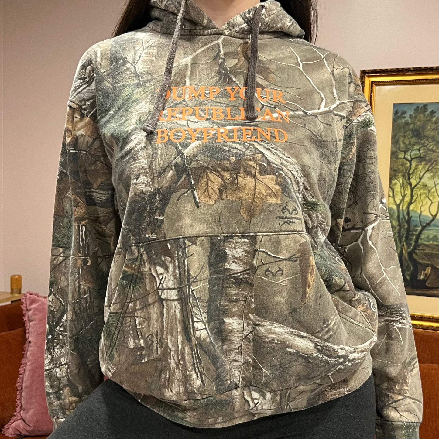 DUMP YOUR REPUBLICAN BOYFRIEND camo hoodie with orange text (M)