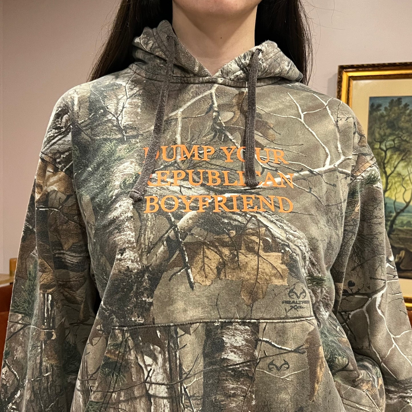 DUMP YOUR REPUBLICAN BOYFRIEND camo hoodie with orange text (M)