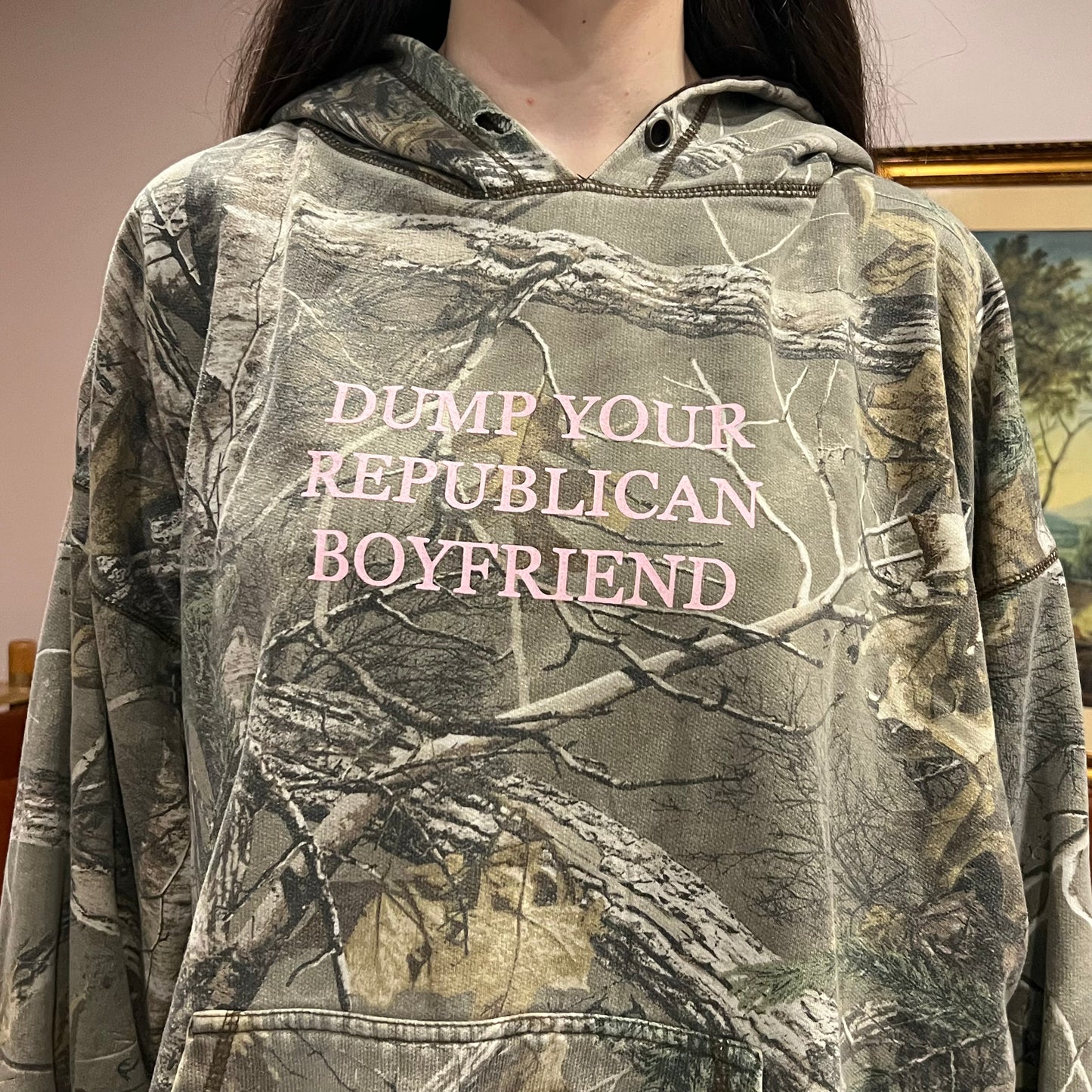 DUMP YOUR REPUBLICAN BOYFRIEND camo hoodie with pink text (2XL)