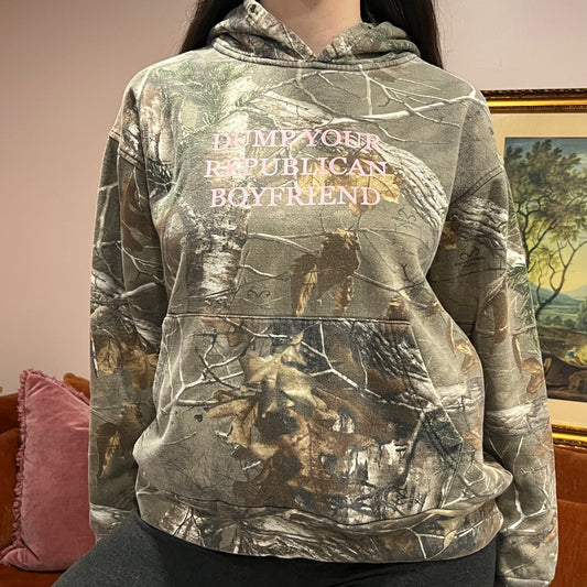 DUMP YOUR REPUBLICAN BOYFRIEND camo hoodie with pink text (L)