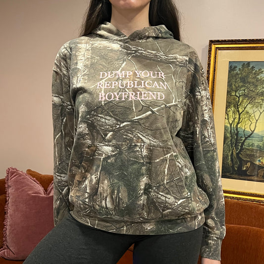 DUMP YOUR REPUBLICAN BOYFRIEND camo hoodie with pink text (L)