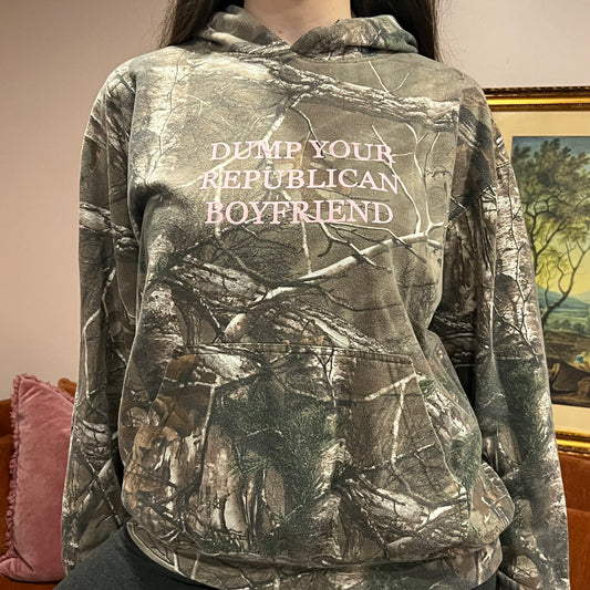 DUMP YOUR REPUBLICAN BOYFRIEND camo hoodie with pink text (L)