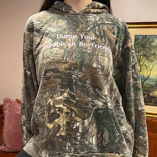 DUMP YOUR REPUBLICAN BOYFRIEND camo hoodie with pink text (L)