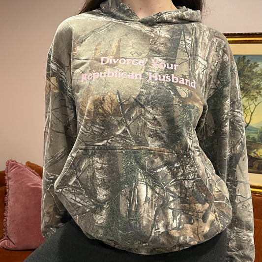 DIVORCE YOUR REPUBLICAN HUSBAND camo hoodie with pink text (M)