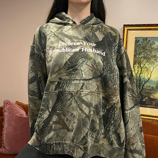 DIVORCE YOUR REPUBLICAN HUSBAND camo hoodie with pink text (2XL)