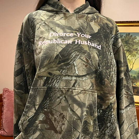 DIVORCE YOUR REPUBLICAN HUSBAND camo hoodie with pink text (2XL)
