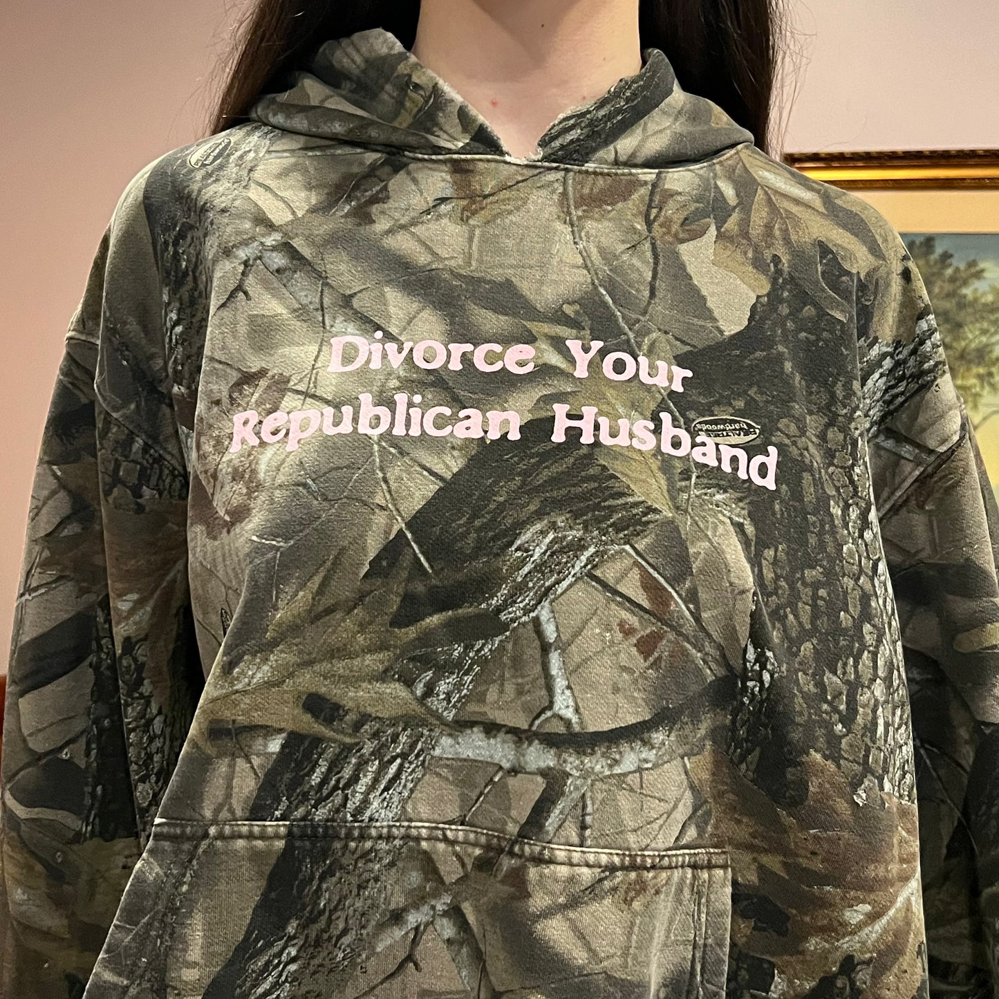 DIVORCE YOUR REPUBLICAN HUSBAND camo hoodie with pink text (2XL)