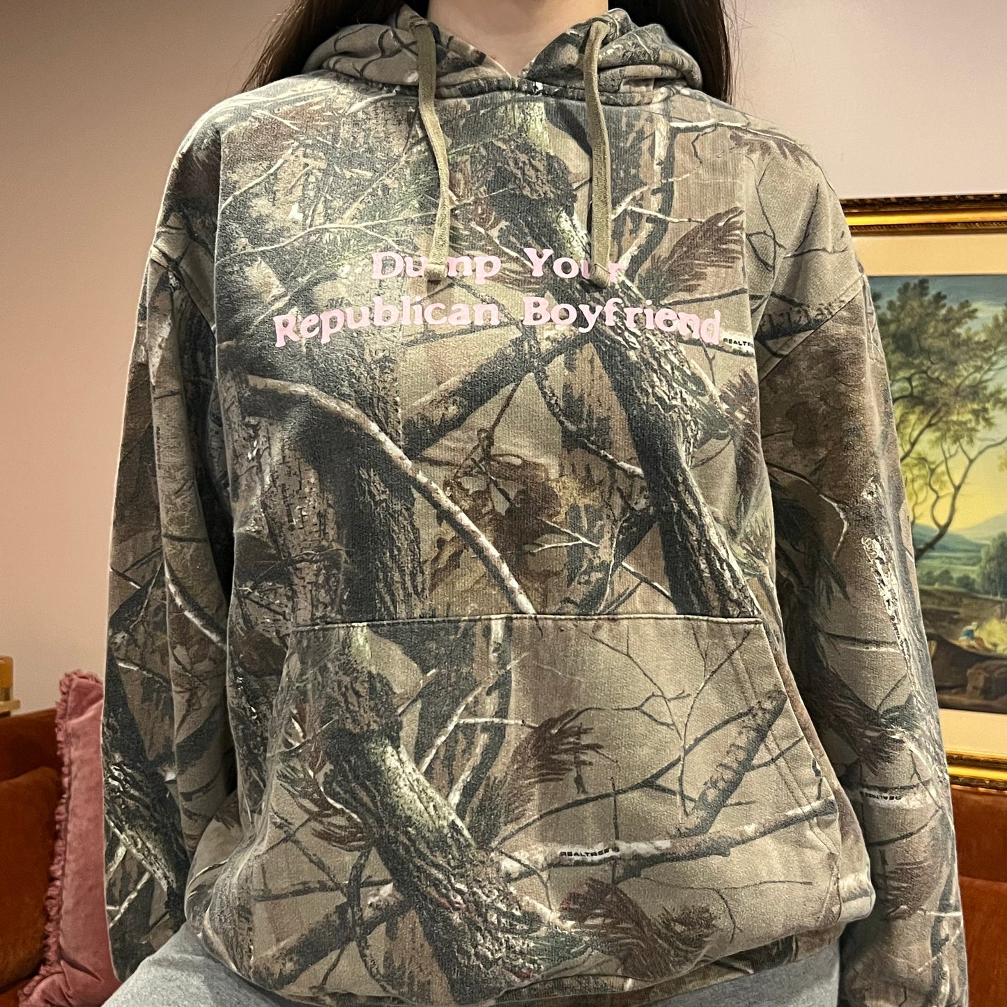 DUMP YOUR REPUBLICAN BOYFRIEND camo hoodie with pink text (XL)