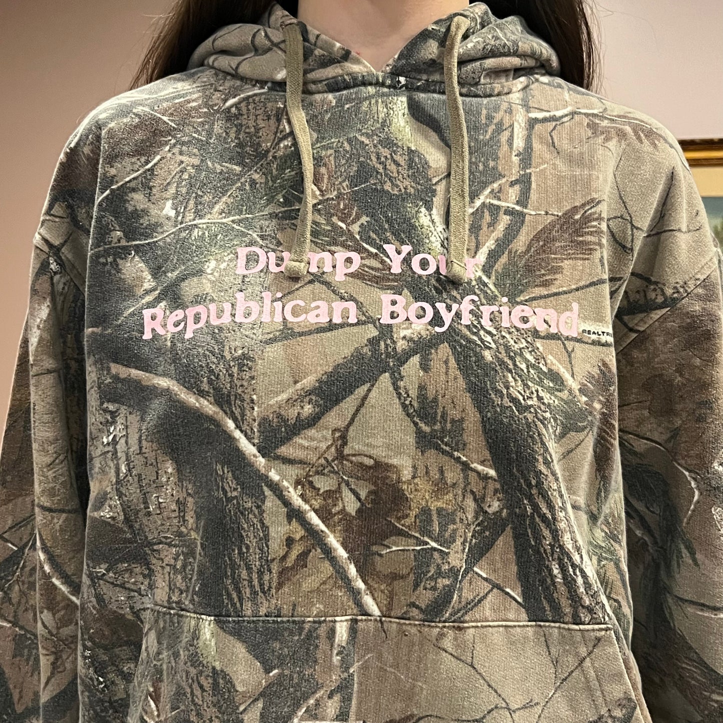 DUMP YOUR REPUBLICAN BOYFRIEND camo hoodie with pink text (XL)
