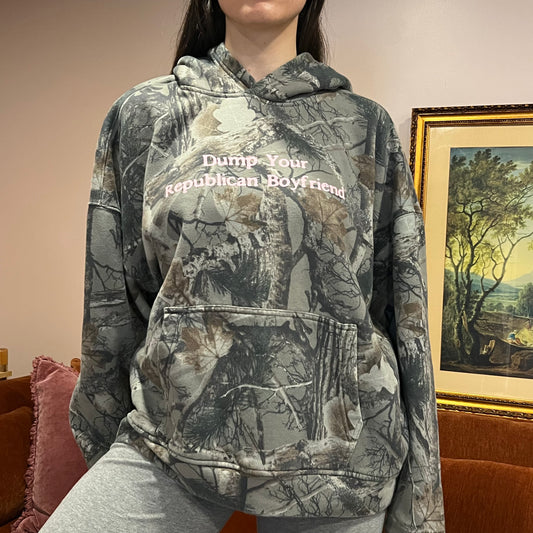 DUMP YOUR REPUBLICAN BOYFRIEND camo hoodie with pink text (XL)