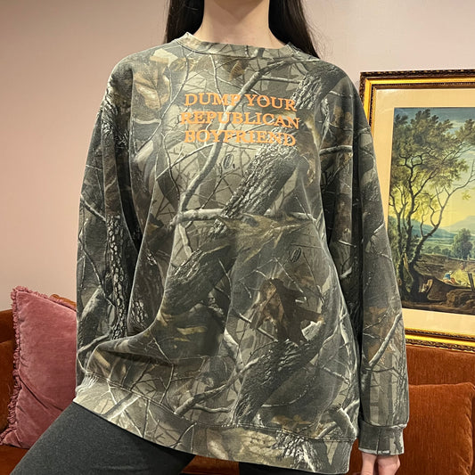 DUMP YOUR REPUBLICAN BOYFRIEND camo crewneck with orange text (2XL)