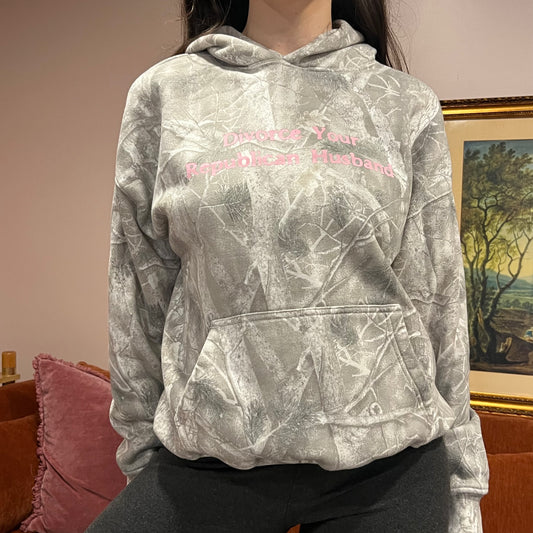 DIVORCE YOUR REPUBLICAN HUSBAND white camo hoodie with pink text (S)