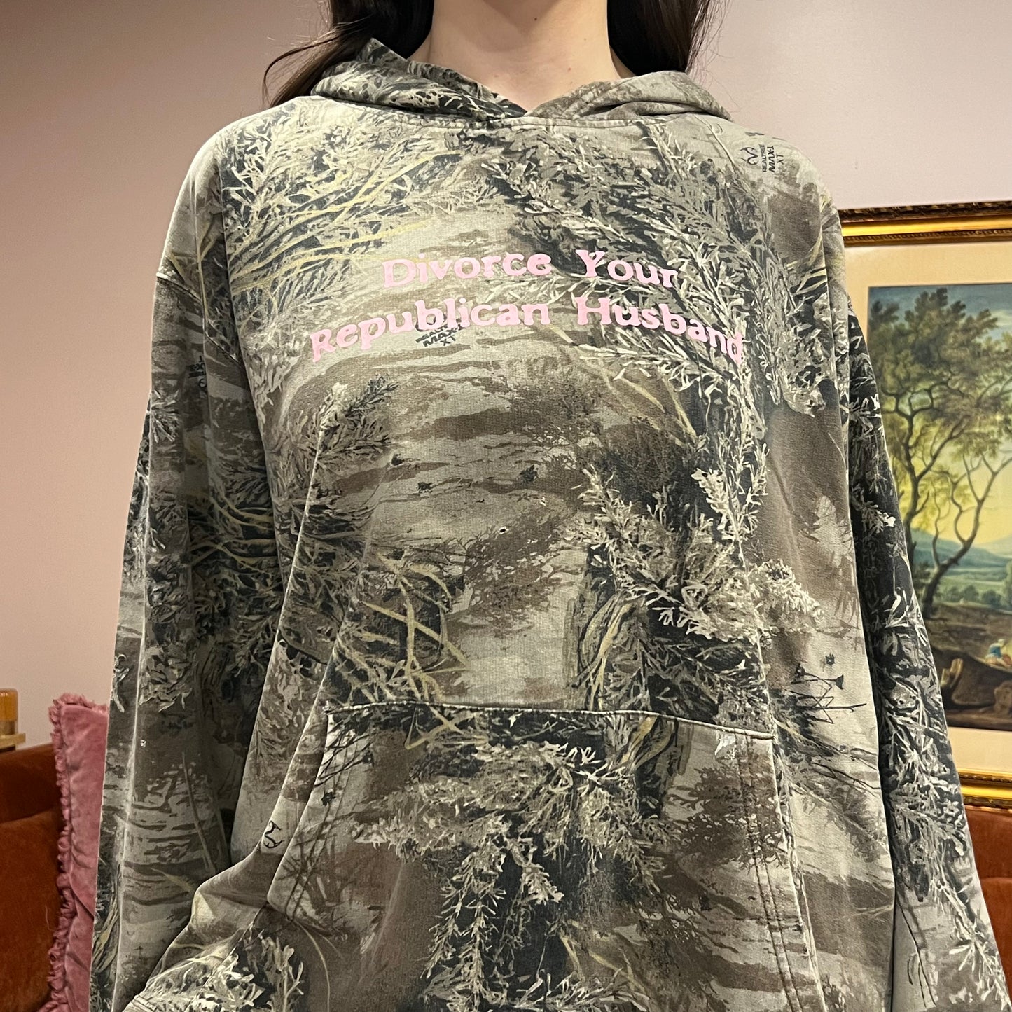 DIVORCE YOUR REPUBLICAN HUSBAND camo hoodie with pink text (2XL)