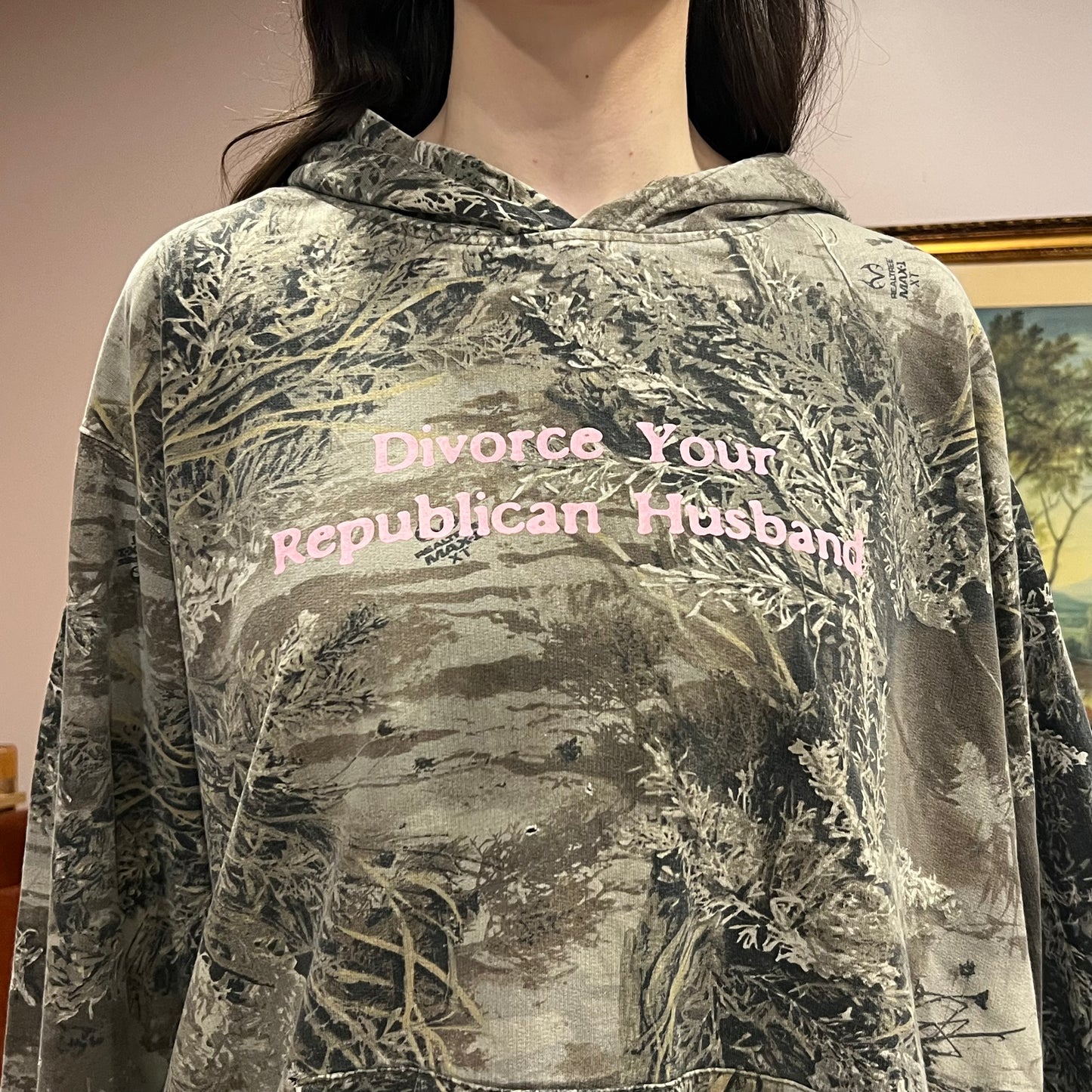 DIVORCE YOUR REPUBLICAN HUSBAND camo hoodie with pink text (2XL)