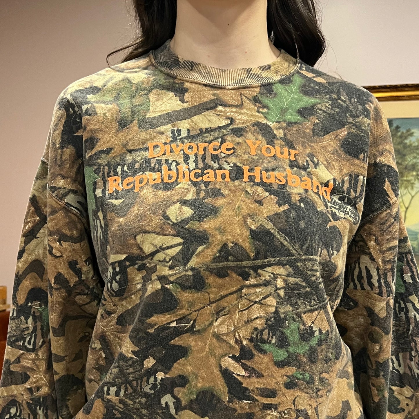 DIVORCE YOUR REPUBLICAN HUSBAND camo hoodie with orange text (L/XL)