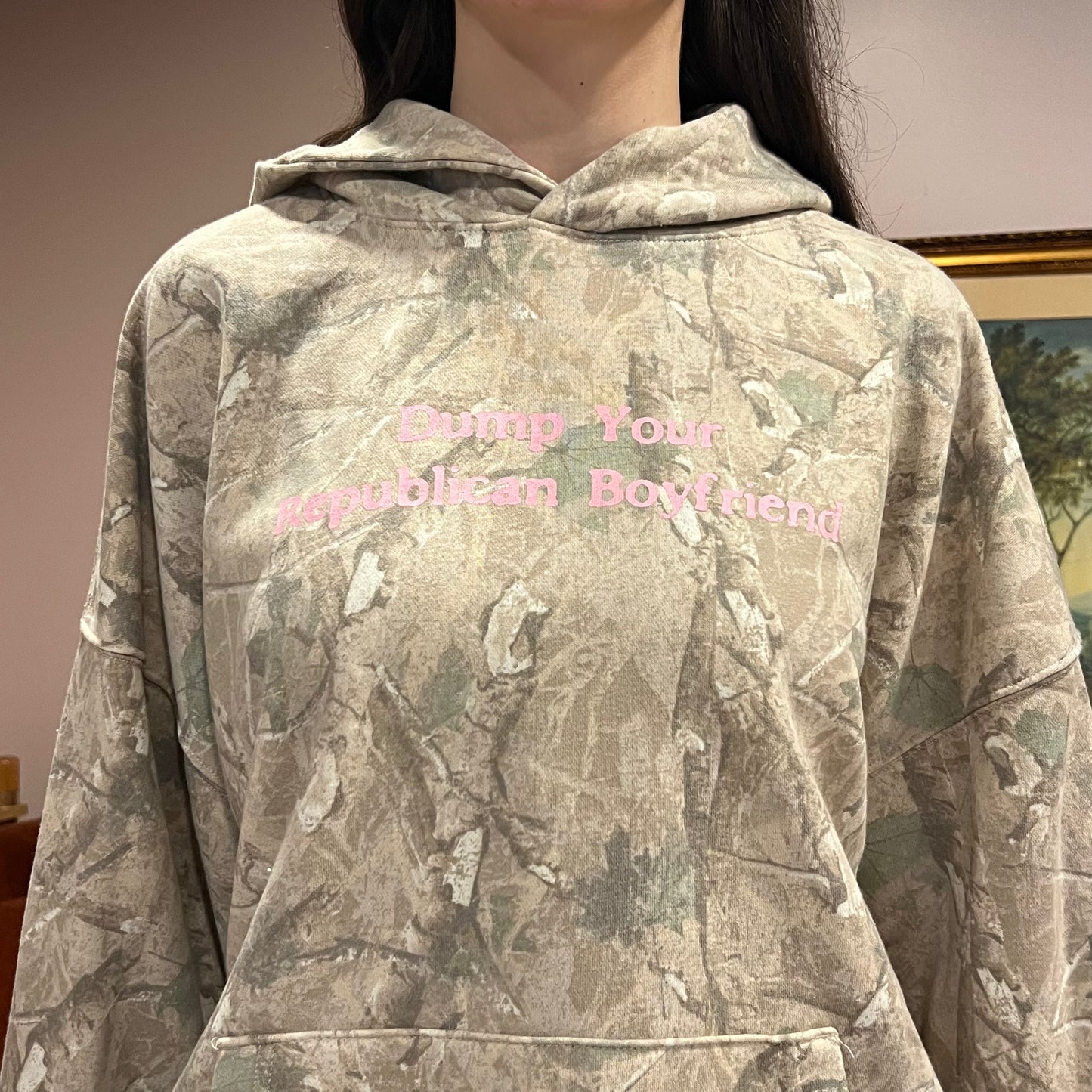 DUMP YOUR REPUBLICAN BOYFRIEND white camo hoodie with pink text (XL)