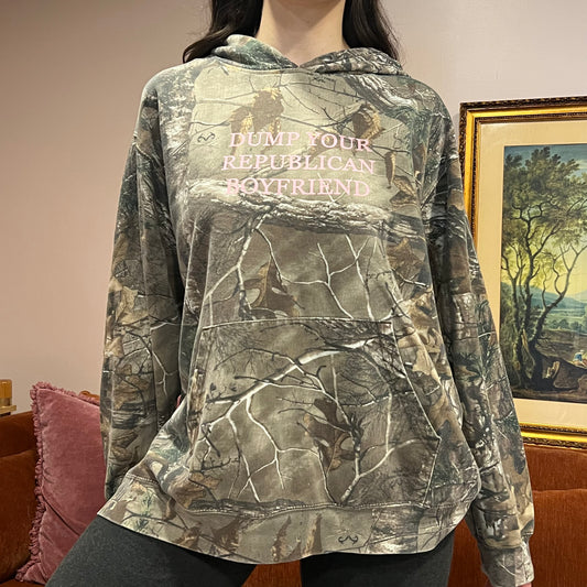 DUMP YOUR REPUBLICAN BOYFRIEND camo hoodie with pink text (XL)