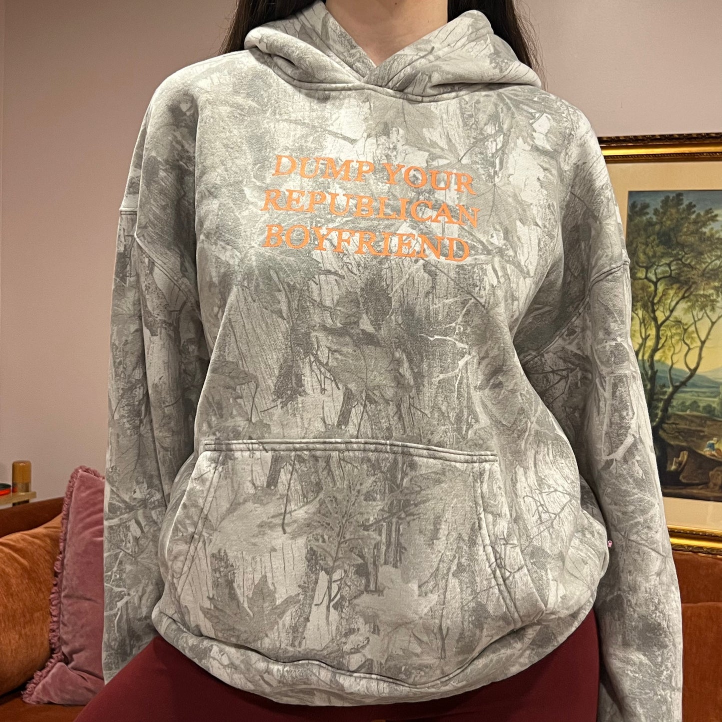DUMP YOUR REPUBLICAN BOYFRIEND white camo hoodie with orange text (M)