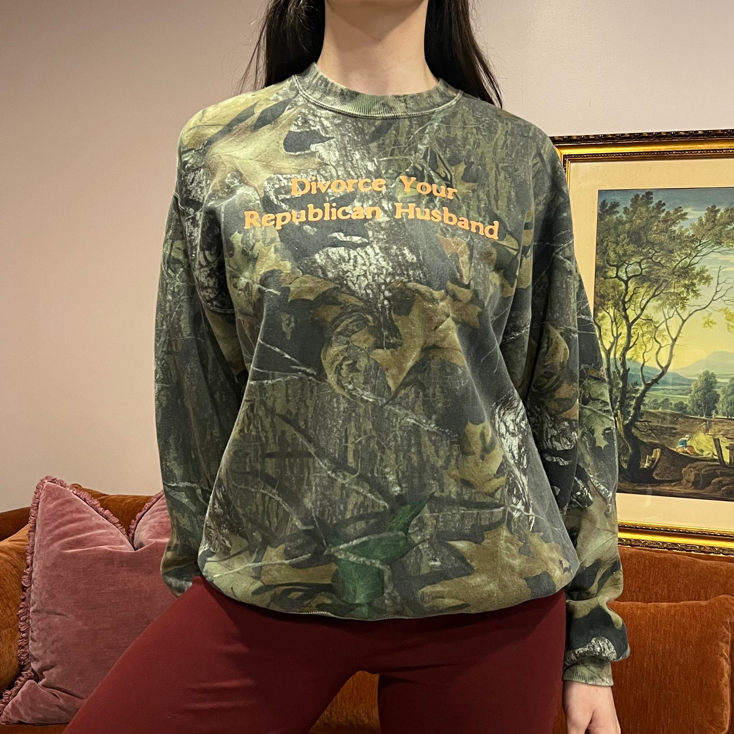DIVORCE YOUR REPUBLICAN HUSBAND camo crewneck with orange text (L)