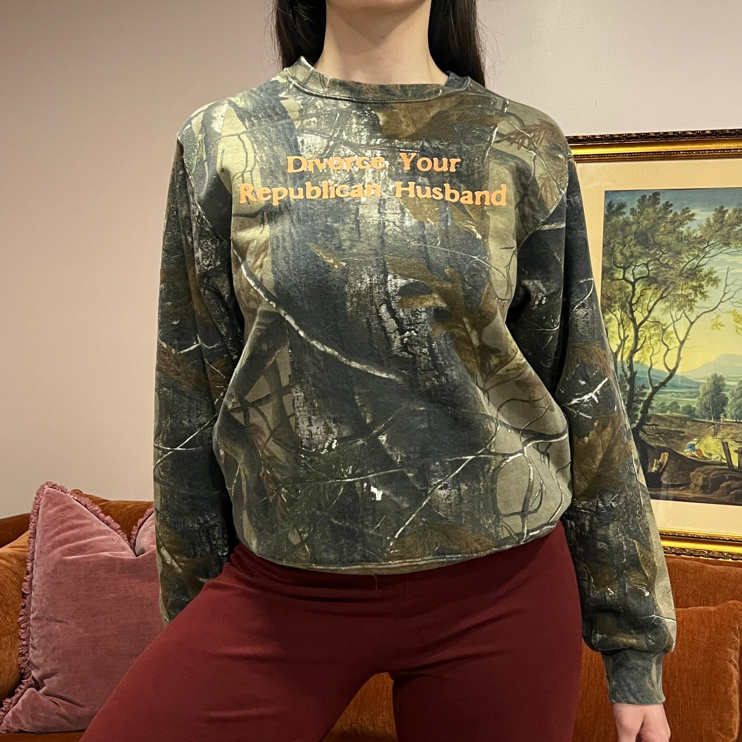 DIVORCE YOUR REPUBLICAN HUSBAND camo crewneck with orange text (S)