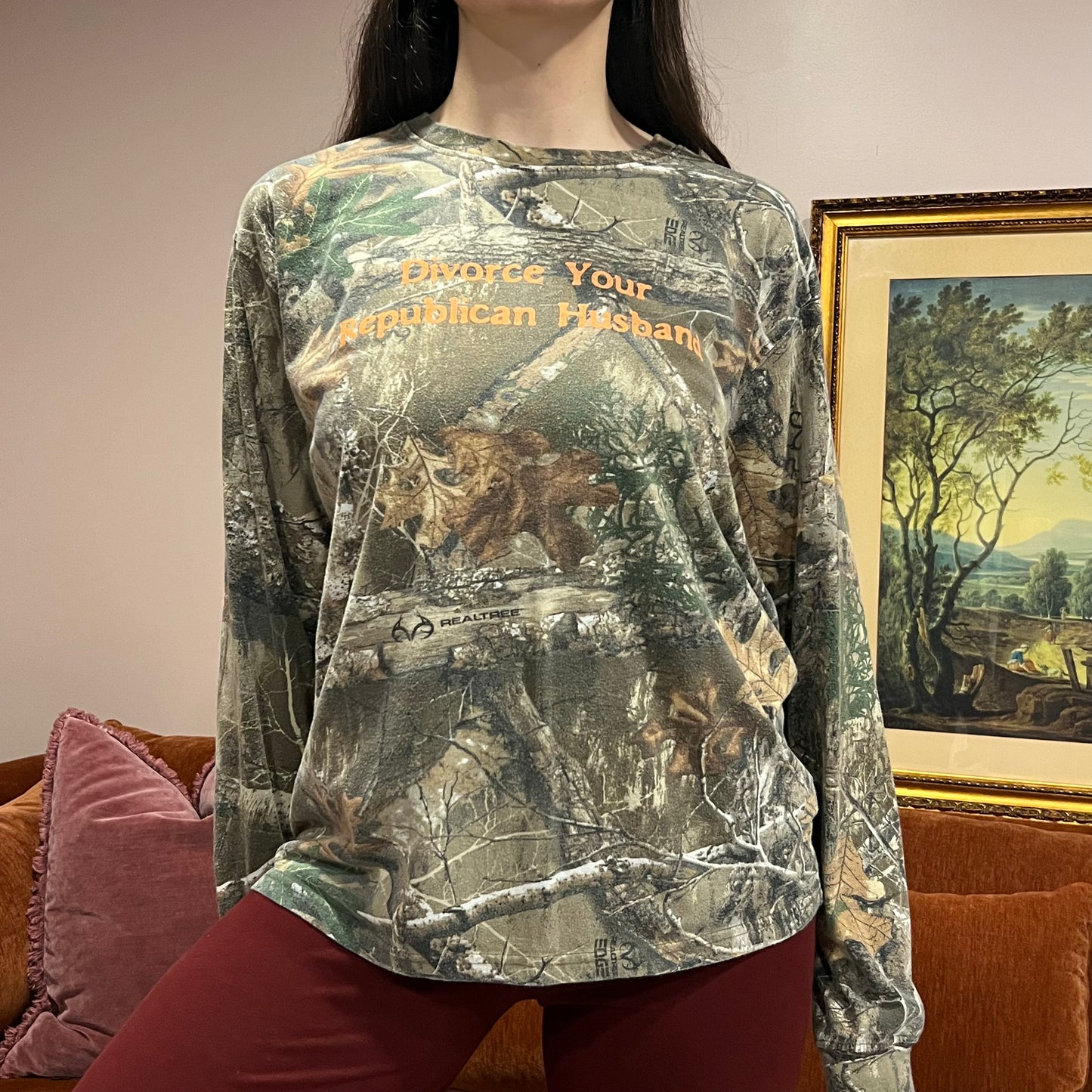 DIVORCE YOUR REPUBLICAN HUSBAND camo long sleeve t-shirt with orange text (L)