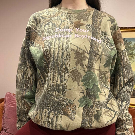 DUMP YOUR REPUBLICAN BOYFRIEND camo crewneck with pink text (XL)